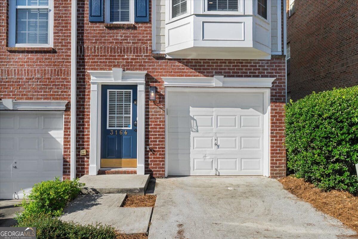 2 bedroom, 2.5 bathroom, 1,650 sq ft single family residence for sale at 3164 Mill Springs Circle, Buford, GA 30519 — photo 4