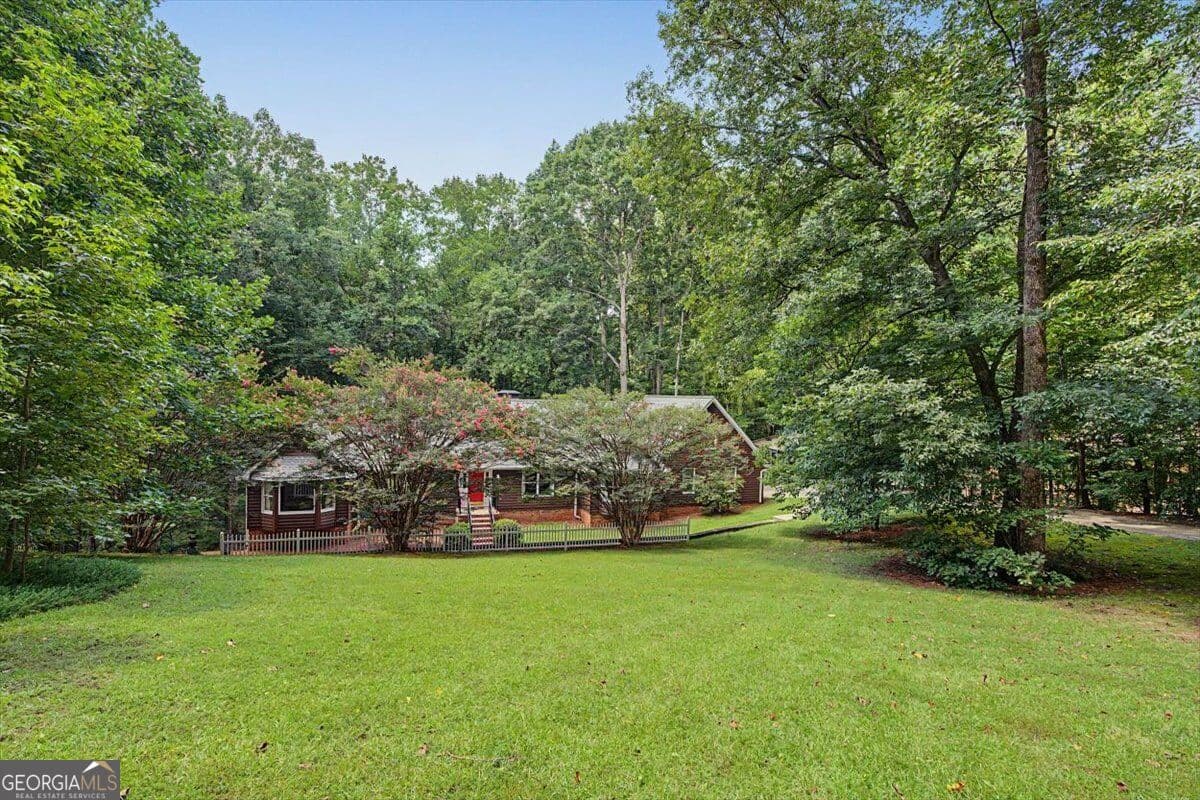 5 bedroom, 5.5 bathroom, 6,863 sq ft single family residence for sale at 1244 Timberland Drive, Marietta, GA 30067 — photo 7
