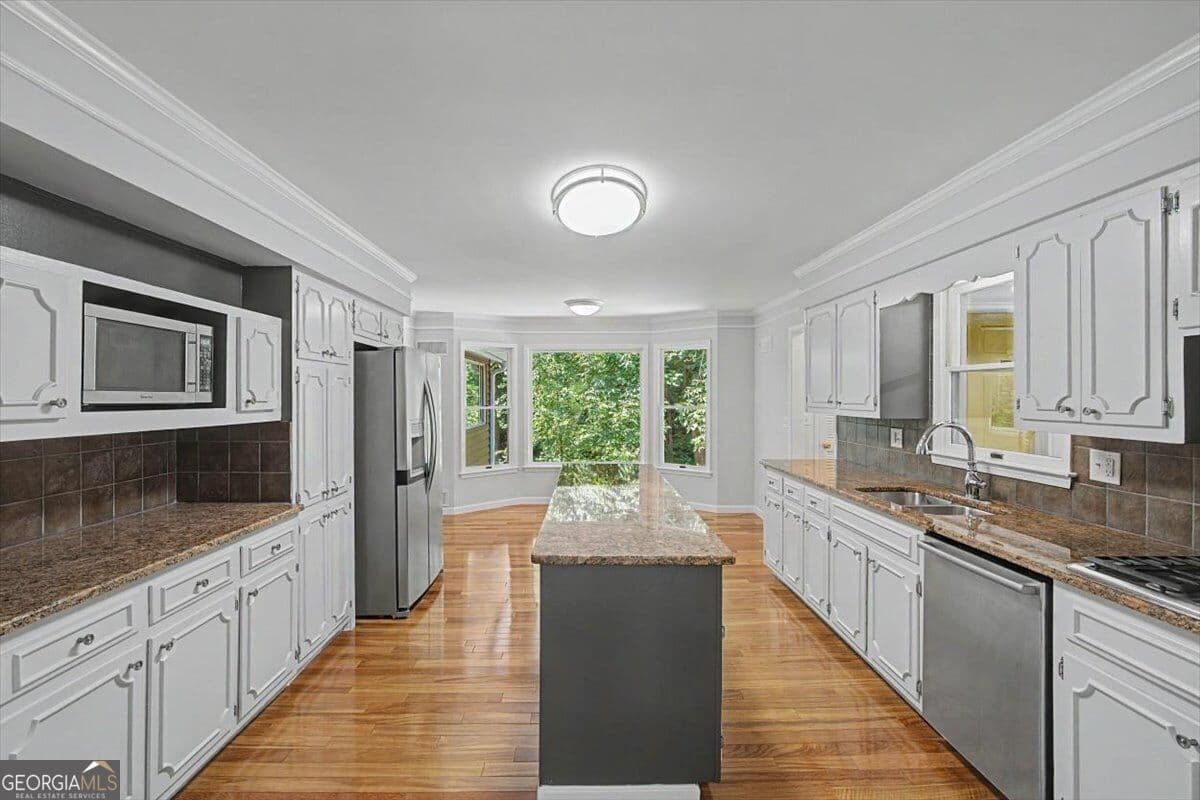 5 bedroom, 5.5 bathroom, 6,863 sq ft single family residence for sale at 1244 Timberland Drive, Marietta, GA 30067 — photo 10