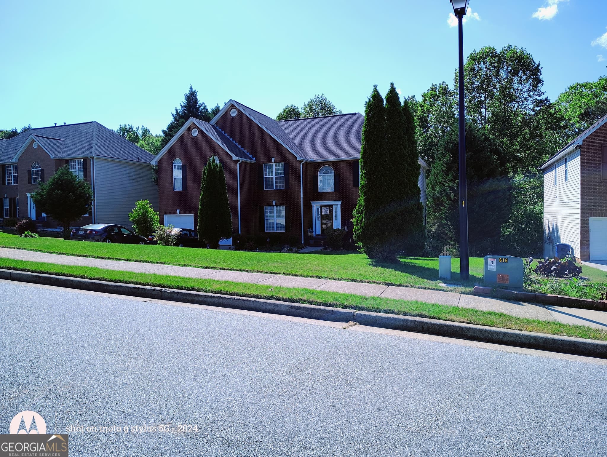 5 bedroom, 4 bathroom, 4,843 sq ft single family residence for sale at 635 Paper Creek Drive, Lawrenceville, GA 30046 — photo 3