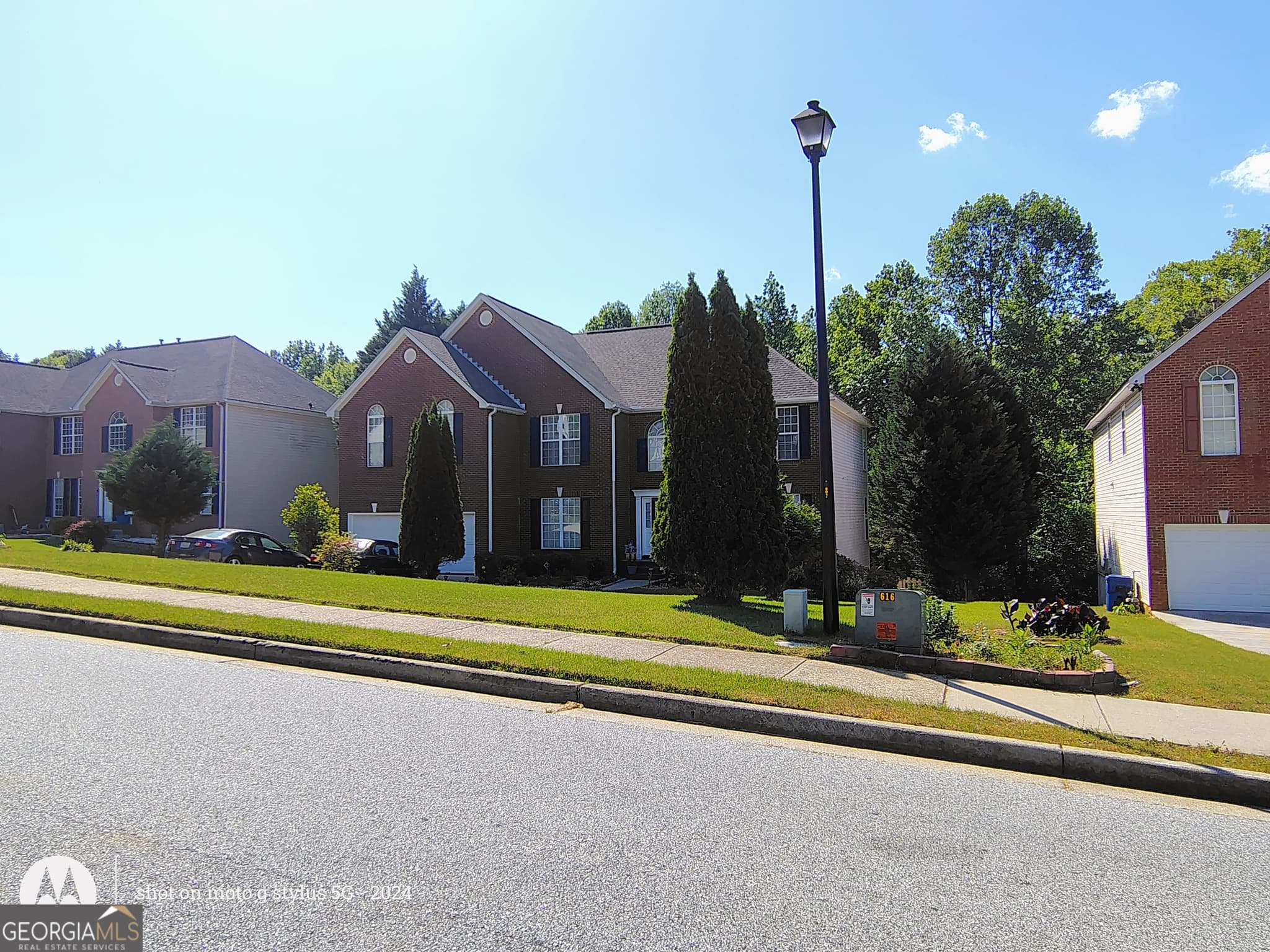 5 bedroom, 4 bathroom, 4,843 sq ft single family residence for sale at 635 Paper Creek Drive, Lawrenceville, GA 30046 — photo 4