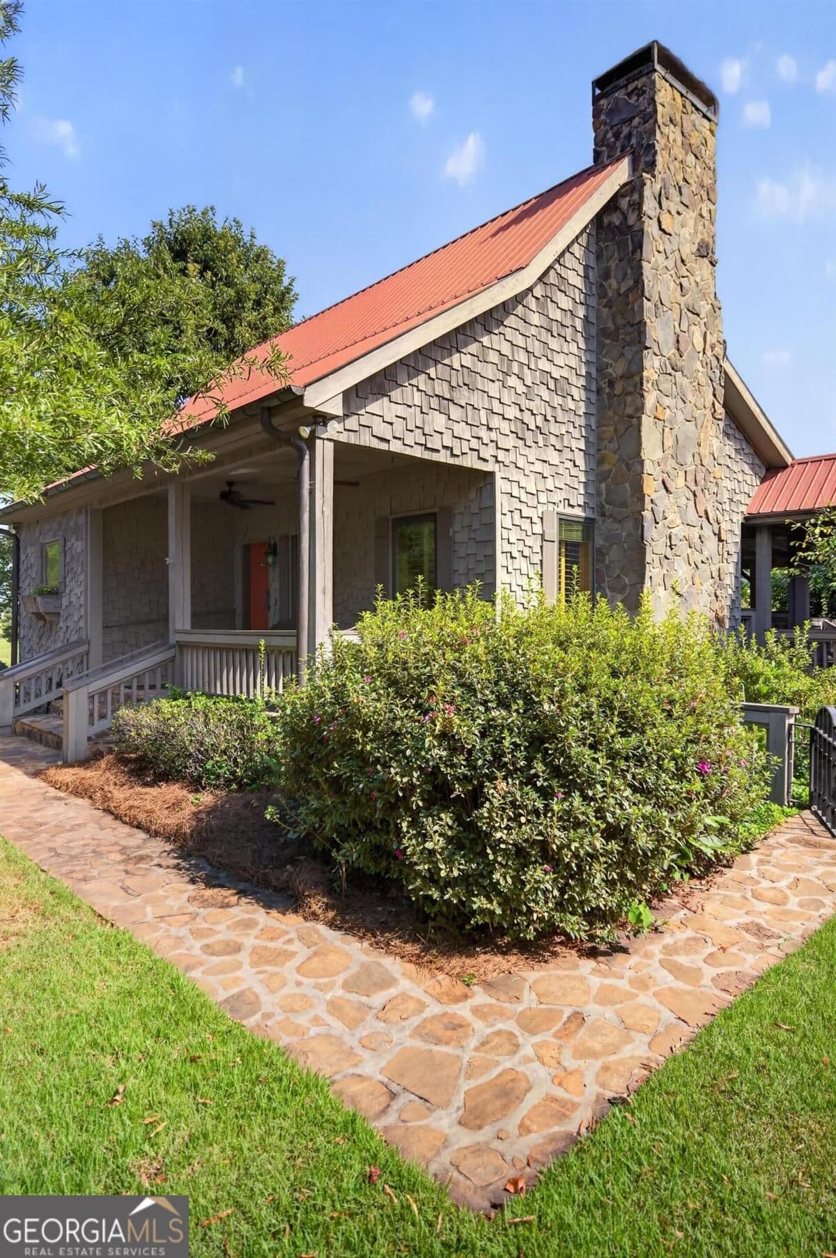 5 bedroom, 4 bathroom, 3,238 sq ft single family residence for sale at 5231 Sandy Creek Road, Madison, GA 30650 — photo 2