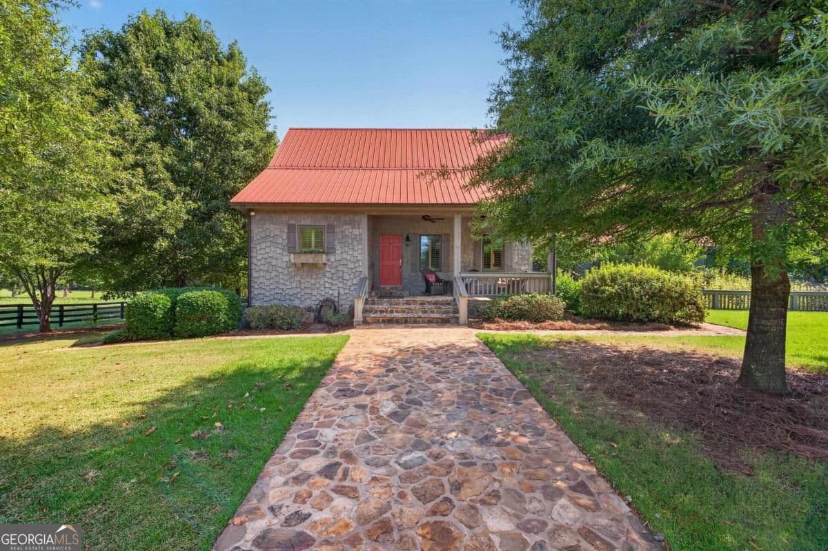 5 bedroom, 4 bathroom, 3,238 sq ft single family residence for sale at 5231 Sandy Creek Road, Madison, GA 30650