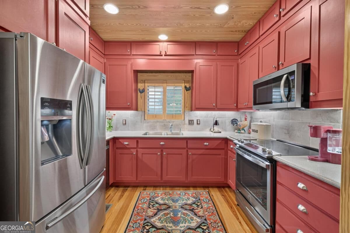 5 bedroom, 4 bathroom, 3,238 sq ft single family residence for sale at 5231 Sandy Creek Road, Madison, GA 30650 — photo 9