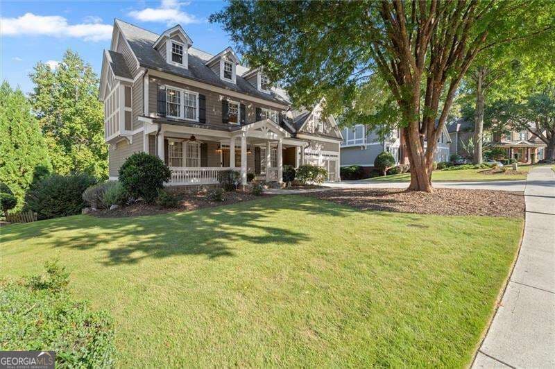 5 bedroom, 5 bathroom, 4,615 sq ft single family residence for sale at 6069 Grand Loop Road, Sugar Hill, GA 30518 — photo 2
