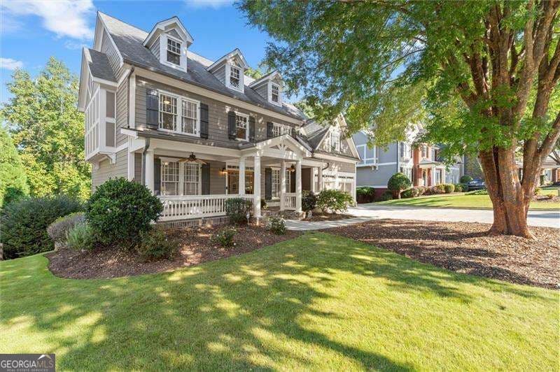 5 bedroom, 5 bathroom, 4,615 sq ft single family residence for sale at 6069 Grand Loop Road, Sugar Hill, GA 30518 — photo 3