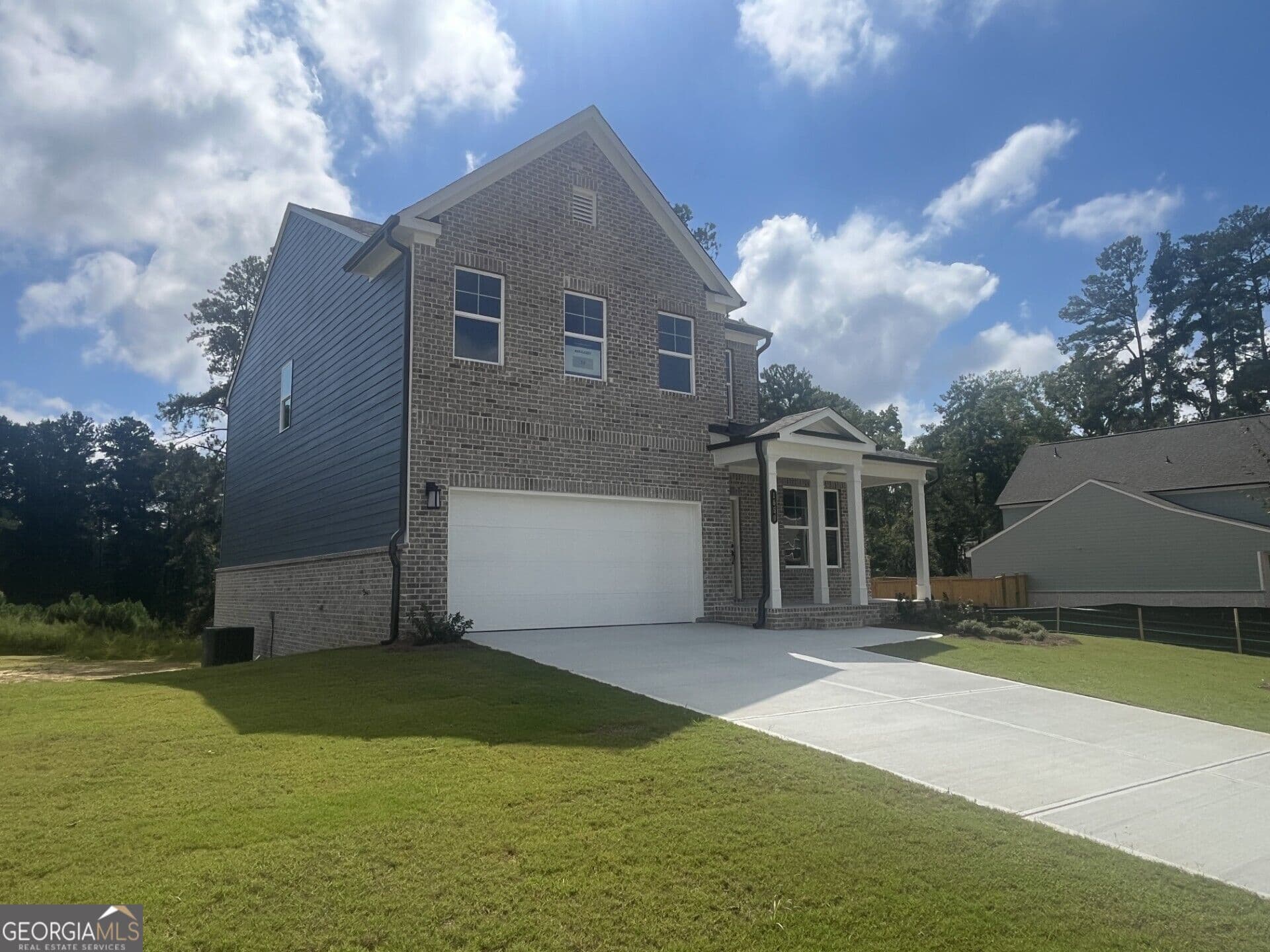 4 bedroom, 3 bathroom, 2,455 sq ft single family residence for sale at 1650 Jordon Brook Drive, Lawrenceville, GA 30043 — photo 2
