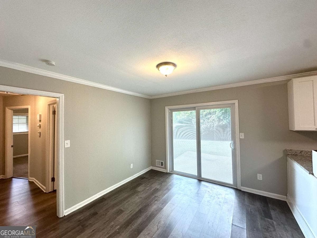 4 bedroom, 2 bathroom, 1,300 sq ft single family residence for sale at 3948 Regent Street, Douglasville, GA 30134 — photo 6