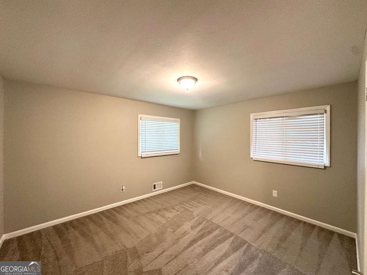 4 bedroom, 2 bathroom, 1,300 sq ft single family residence for sale at 3948 Regent Street, Douglasville, GA 30134 — photo 10
