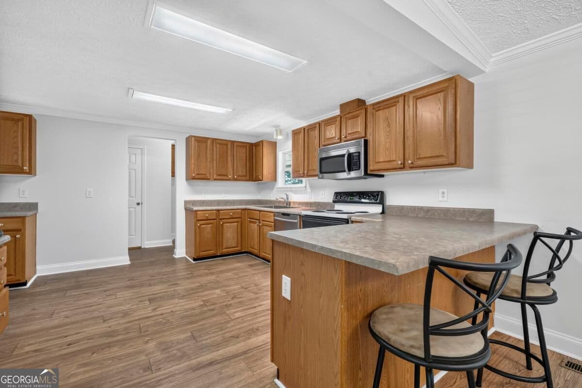 5 bedroom, 3 bathroom, 3,952 sq ft single family residence for sale at 304B Cold Branch Road, Eatonton, GA 31024 — photo 10