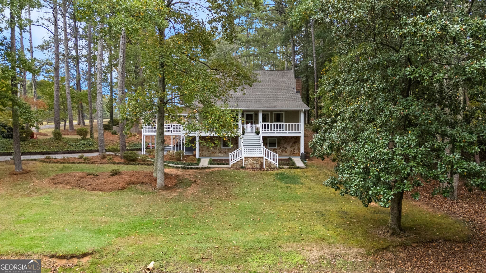 4 bedroom, 3 bathroom, 2,784 sq ft single family residence for sale at 165 Hal Jones Road, Newnan, GA 30263 — photo 1 of 86