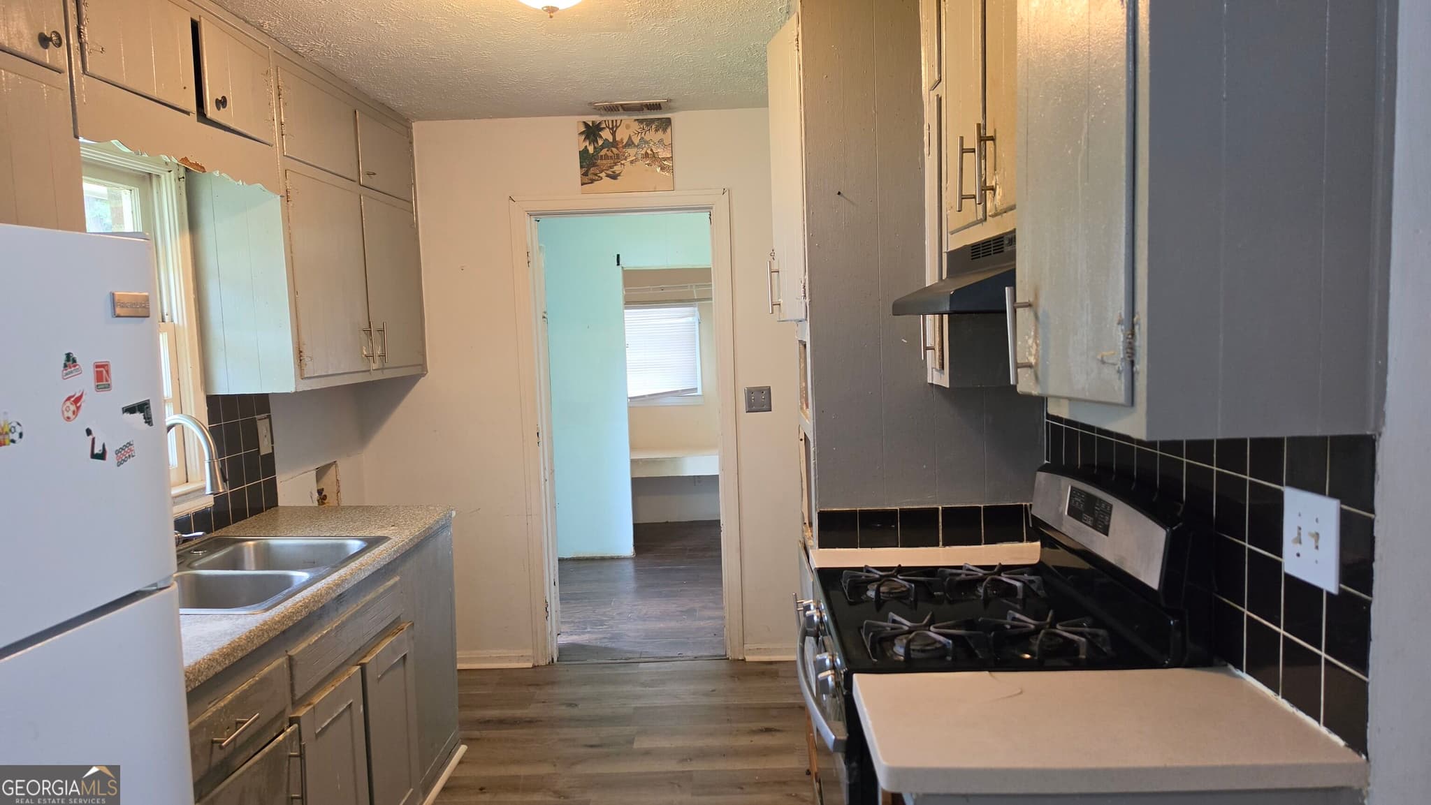 3 bedroom, 1.5 bathroom, 1,375 sq ft single family residence for sale at 632 Pineridge Drive, Forest Park, GA 30297 — photo 4