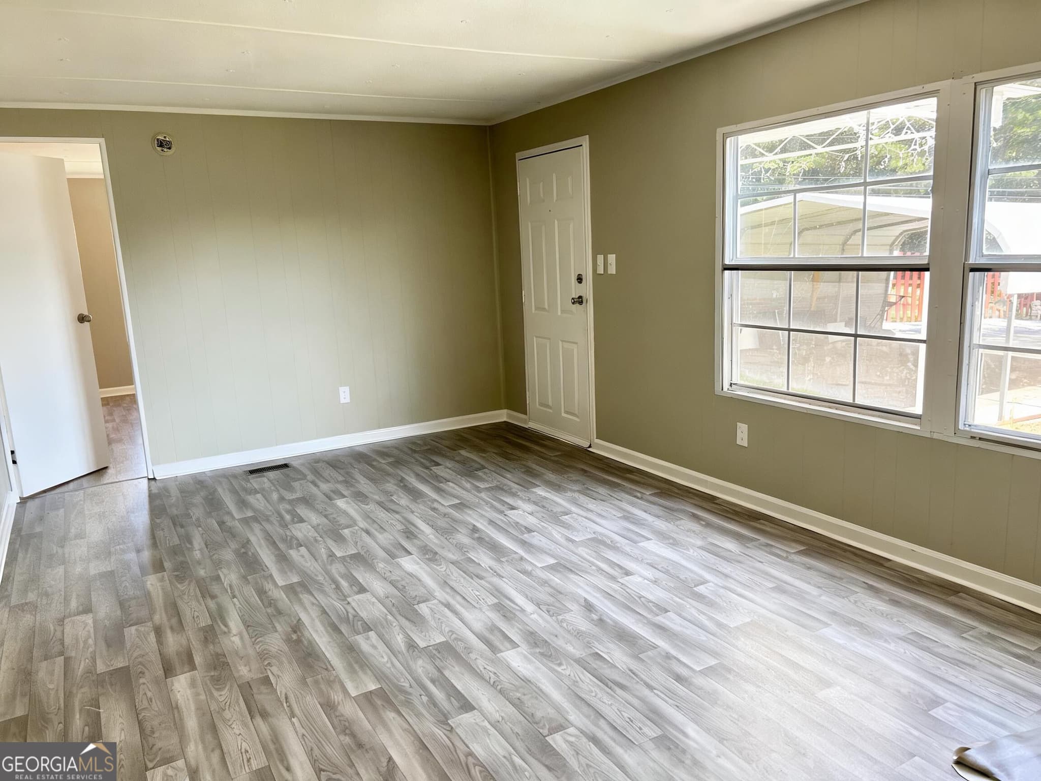 3 bedroom, 2 bathroom, 1,200 sq ft manufactured home,single family residence for sale at 5019 Dicks Hill Parkway, Mount Airy, GA 30563 — photo 4