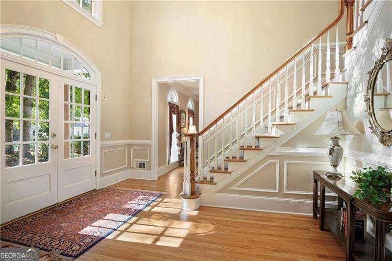 6 bedroom, 5 bathroom, 5,750 sq ft single family residence for sale at 1021 Palmetto Dunes Drive, Johns Creek, GA 30097 — photo 4