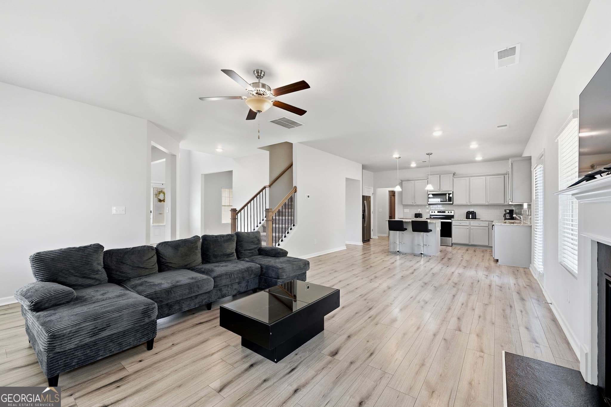 5 bedroom, 3 bathroom, 2,816 sq ft single family residence for sale at 136 Petunia Court, Mcdonough, GA 30252 — photo 6