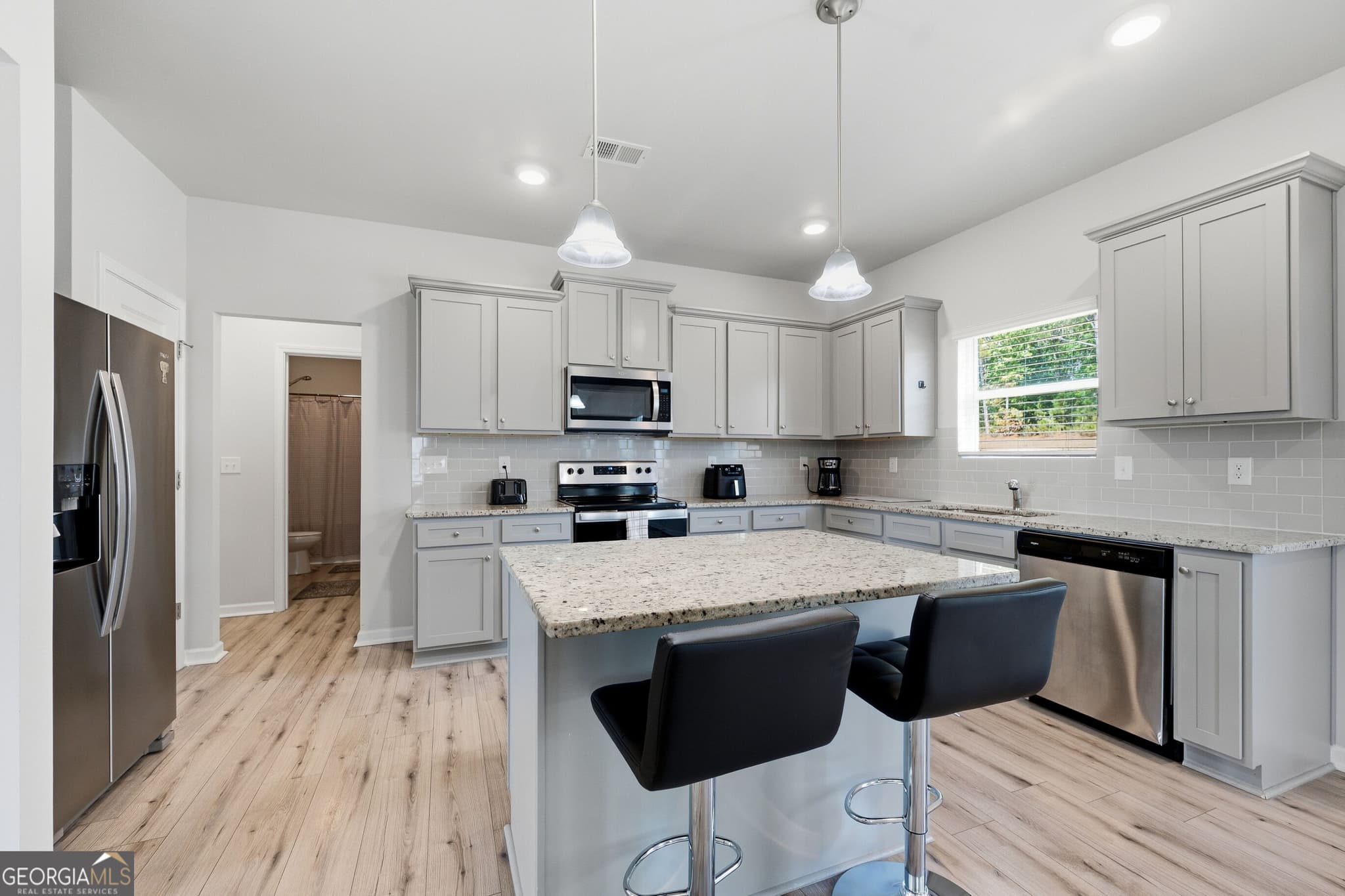 5 bedroom, 3 bathroom, 2,816 sq ft single family residence for sale at 136 Petunia Court, Mcdonough, GA 30252 — photo 3