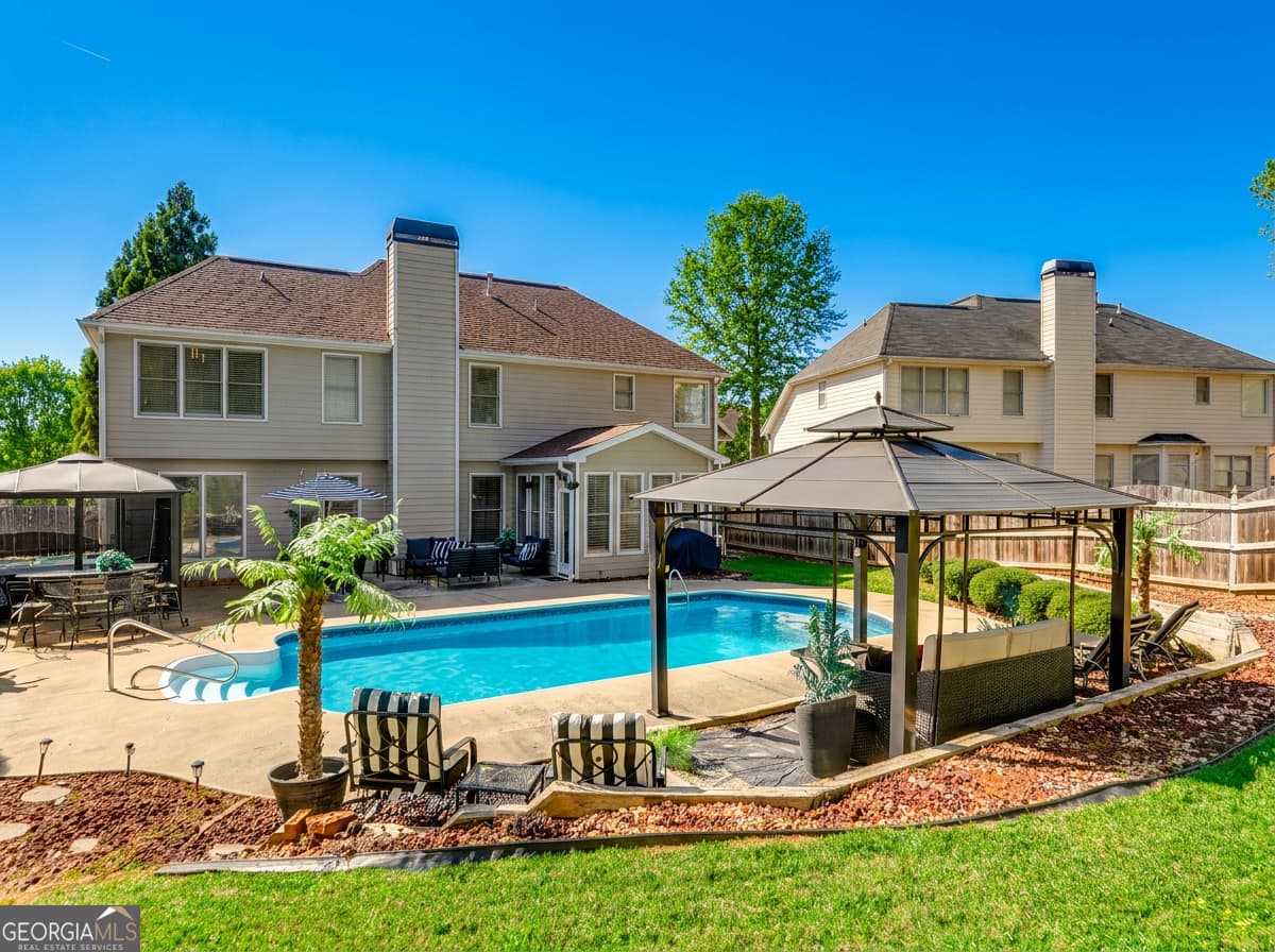 5 bedroom, 3 bathroom single family residence sold at 1430 White Flowers Lane, Lawrenceville, GA 30045