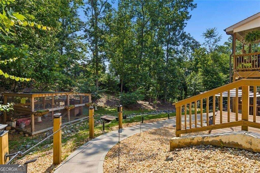 5 bedroom, 3.5 bathroom, 3,956 sq ft single family residence for sale at 6220 Providence Lake Drive, Gainesville, GA 30506 — photo 8