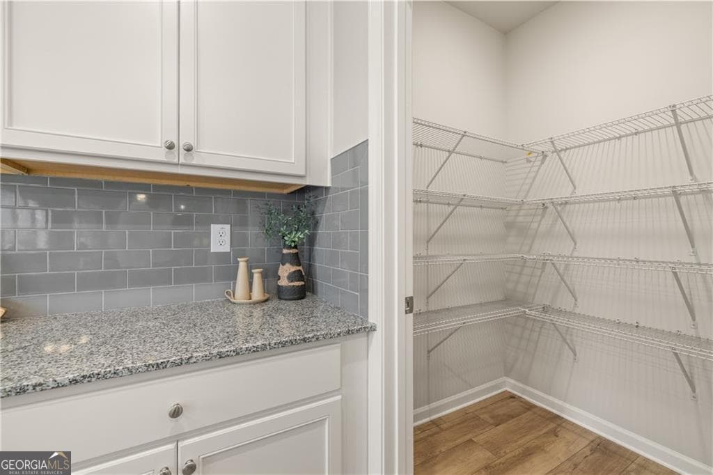 4 bedroom, 2.5 bathroom, 2,506 sq ft single family residence for sale at 211 Whispering Pines Avenue LOT 163, Conyers, GA 30094 — photo 7