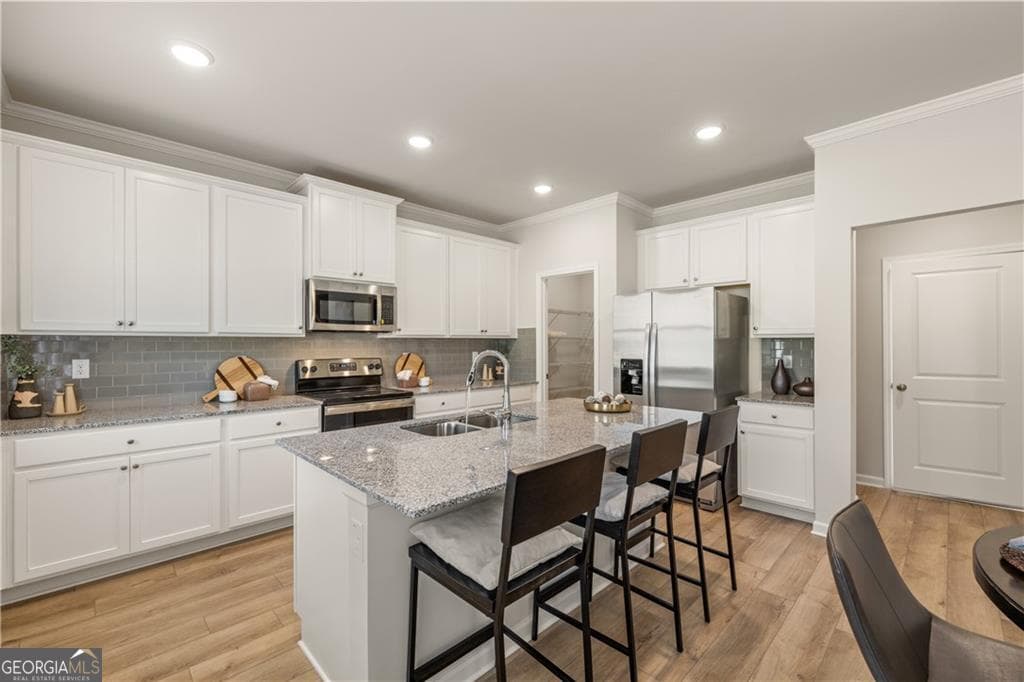 4 bedroom, 2.5 bathroom, 2,506 sq ft single family residence for sale at 211 Whispering Pines Avenue LOT 163, Conyers, GA 30094 — photo 5