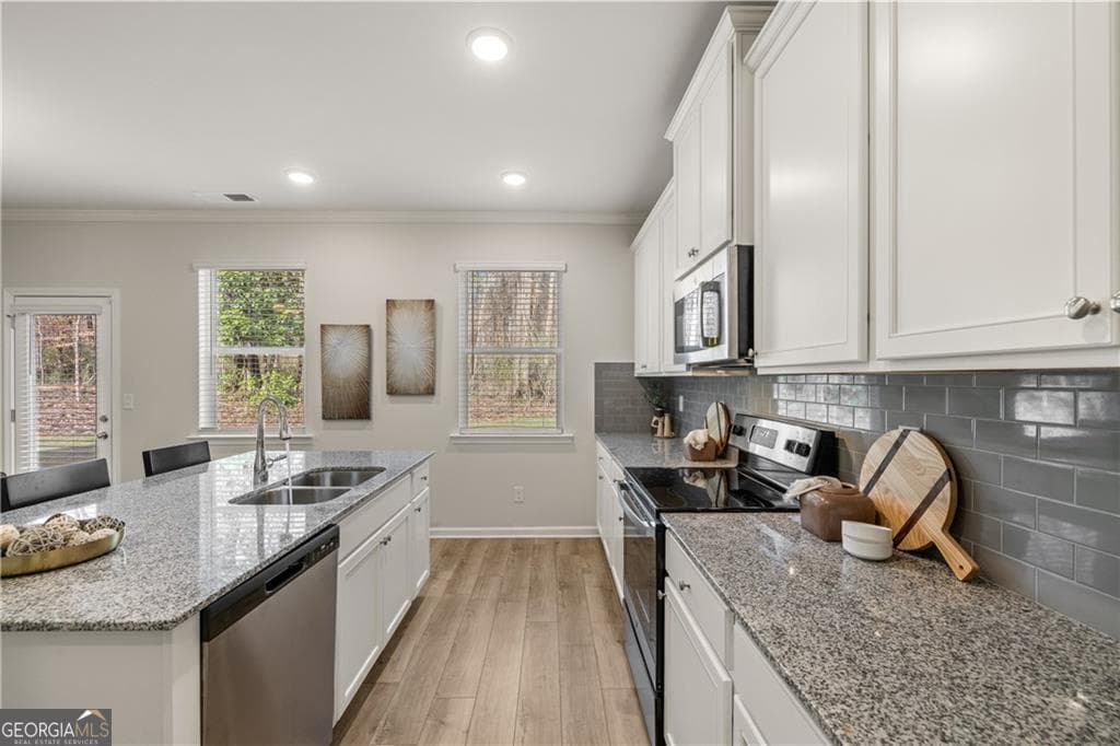 4 bedroom, 2.5 bathroom, 2,506 sq ft single family residence for sale at 211 Whispering Pines Avenue LOT 163, Conyers, GA 30094 — photo 8