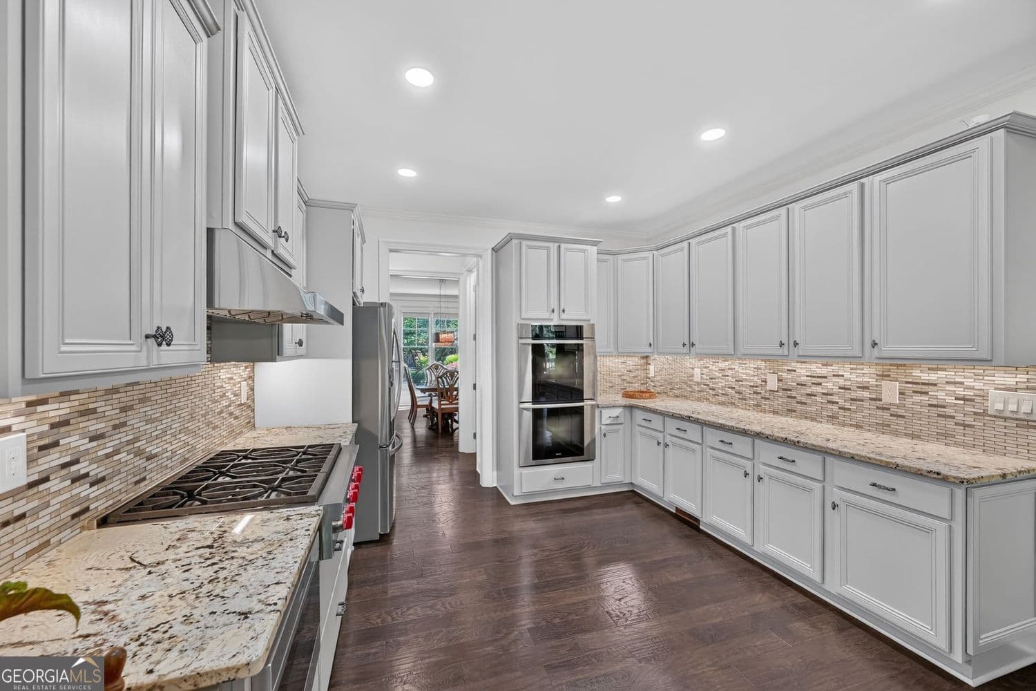6 bedroom, 5.5 bathroom, 5,401 sq ft single family residence for sale at 3130 Caney Estates Place, Cumming, GA 30041 — photo 6