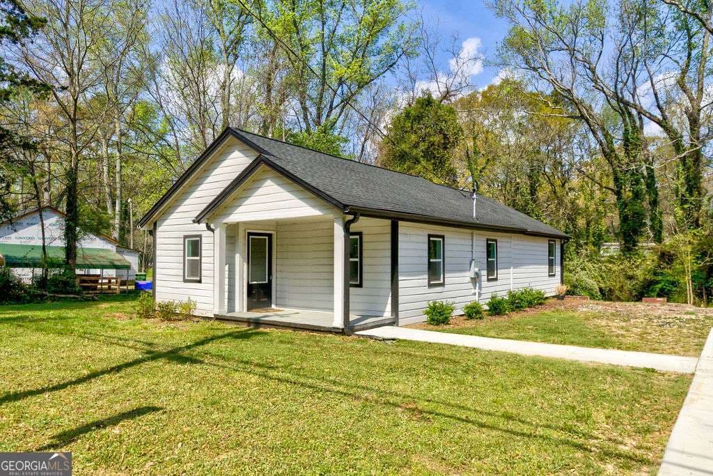 3 bedroom, 1 bathroom, 1,170 sq ft single family residence for sale at 206 Walker Drive, Monroe, GA 30655 — photo 2