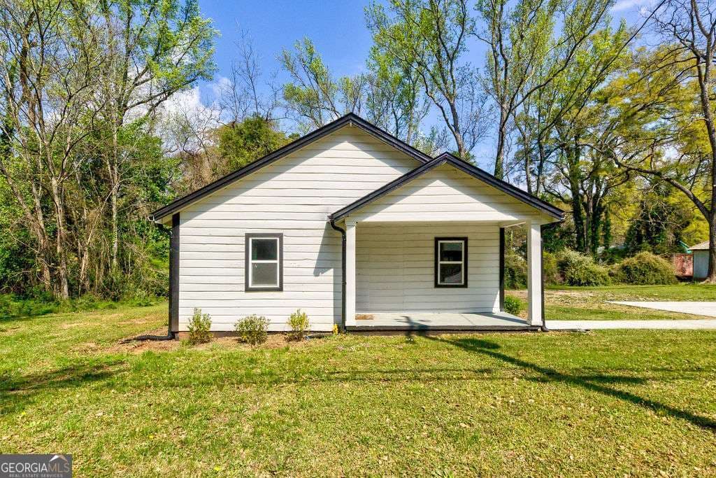 3 bedroom, 1 bathroom, 1,170 sq ft single family residence for sale at 206 Walker Drive, Monroe, GA 30655 — photo 1 of 32