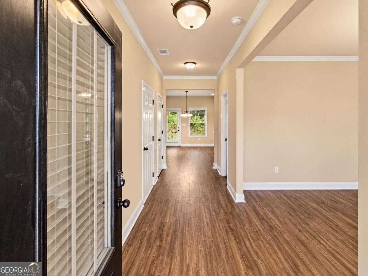 4 bedroom, 2.5 bathroom, 2,265 sq ft single family residence for sale at 6055 Prodigy Lane, Locust Grove, GA 30248 — photo 3