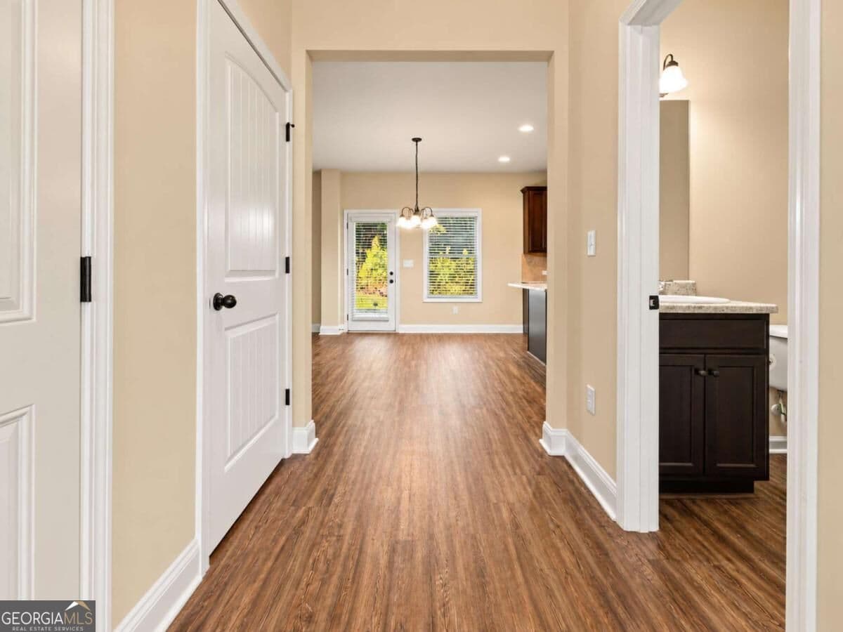 4 bedroom, 2.5 bathroom, 2,265 sq ft single family residence for sale at 6055 Prodigy Lane, Locust Grove, GA 30248 — photo 4