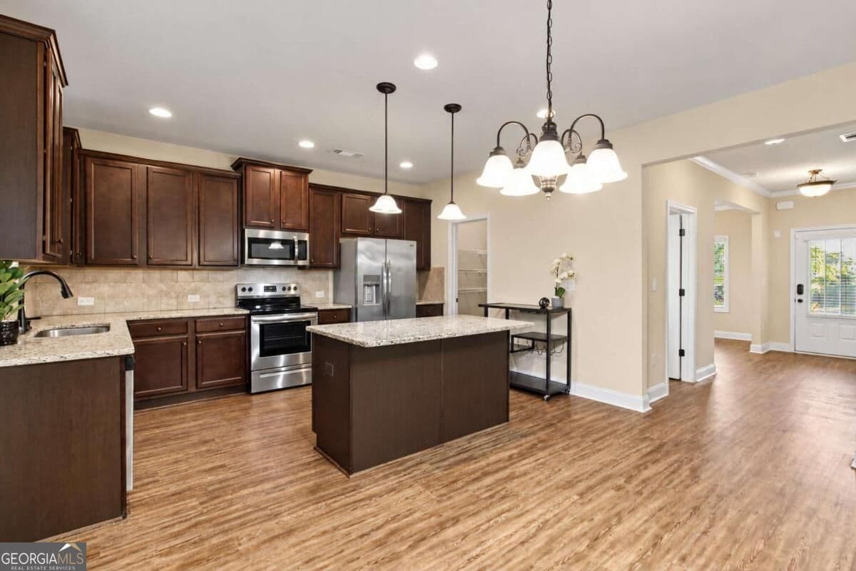 4 bedroom, 2.5 bathroom, 2,265 sq ft single family residence for sale at 6055 Prodigy Lane, Locust Grove, GA 30248 — photo 8