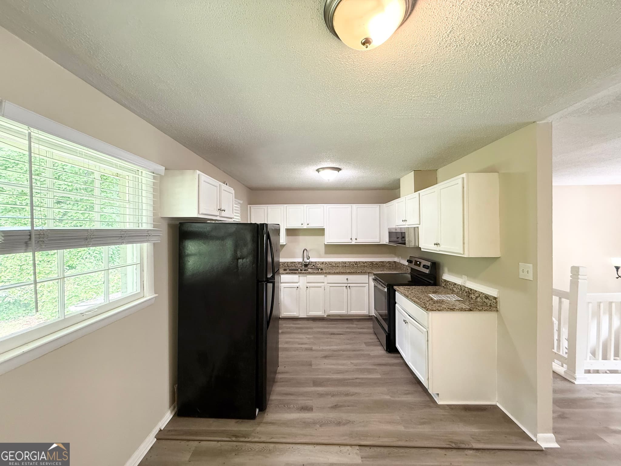 5 bedroom, 2 bathroom, 2,000 sq ft single family residence for sale at 2782 Ocean Valley Drive, Atlanta, GA 30349 — photo 8