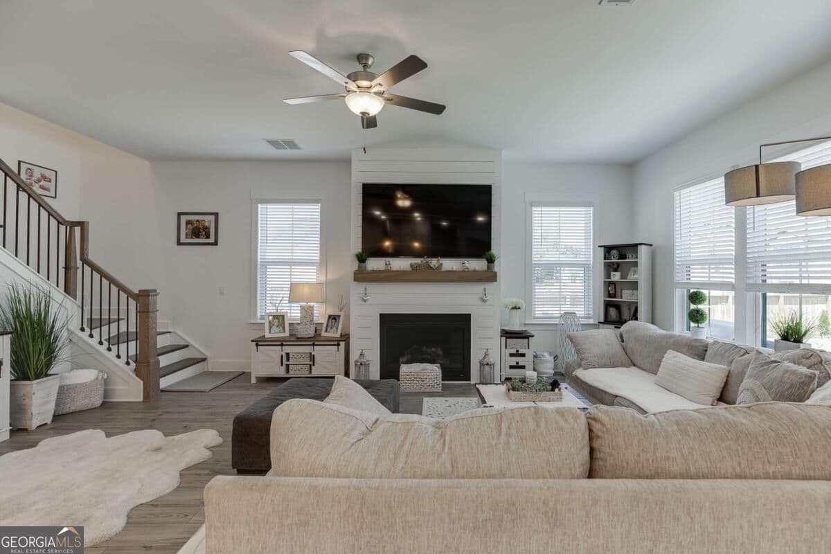 5 bedroom, 4.5 bathroom, 3,485 sq ft single family residence for sale at 2570 Bertrand Way, Cumming, GA 30041 — photo 4