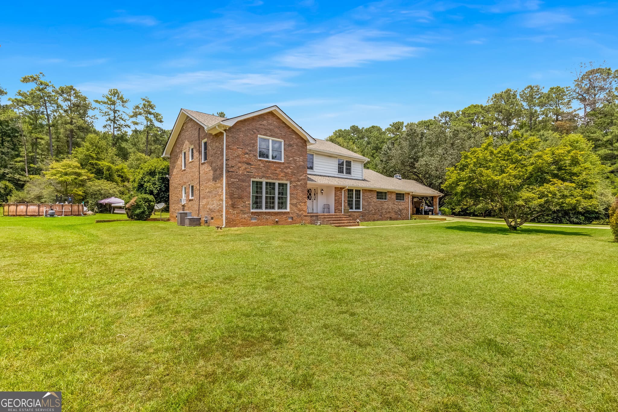 5 bedroom, 4.5 bathroom, 4,175 sq ft single family residence for sale at 164 Buttrill Road, Jackson, GA 30233 — photo 2
