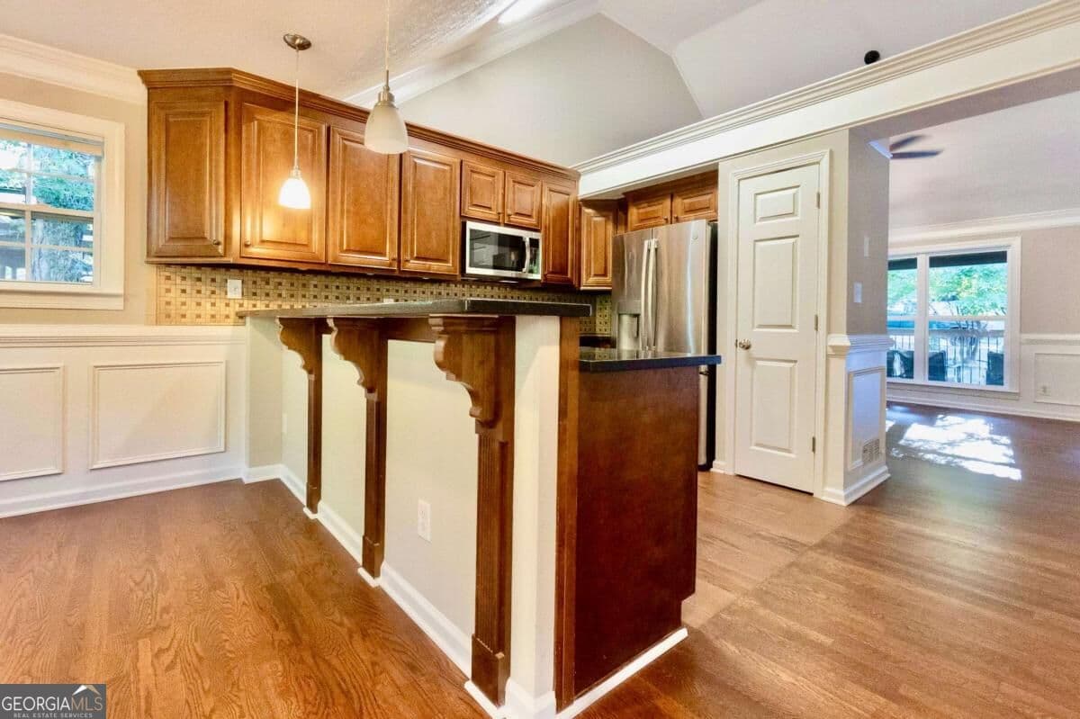 4 bedroom, 3 bathroom single family residence for sale at 5507 Riverside Drive, Sugar Hill, GA 30518 — photo 5