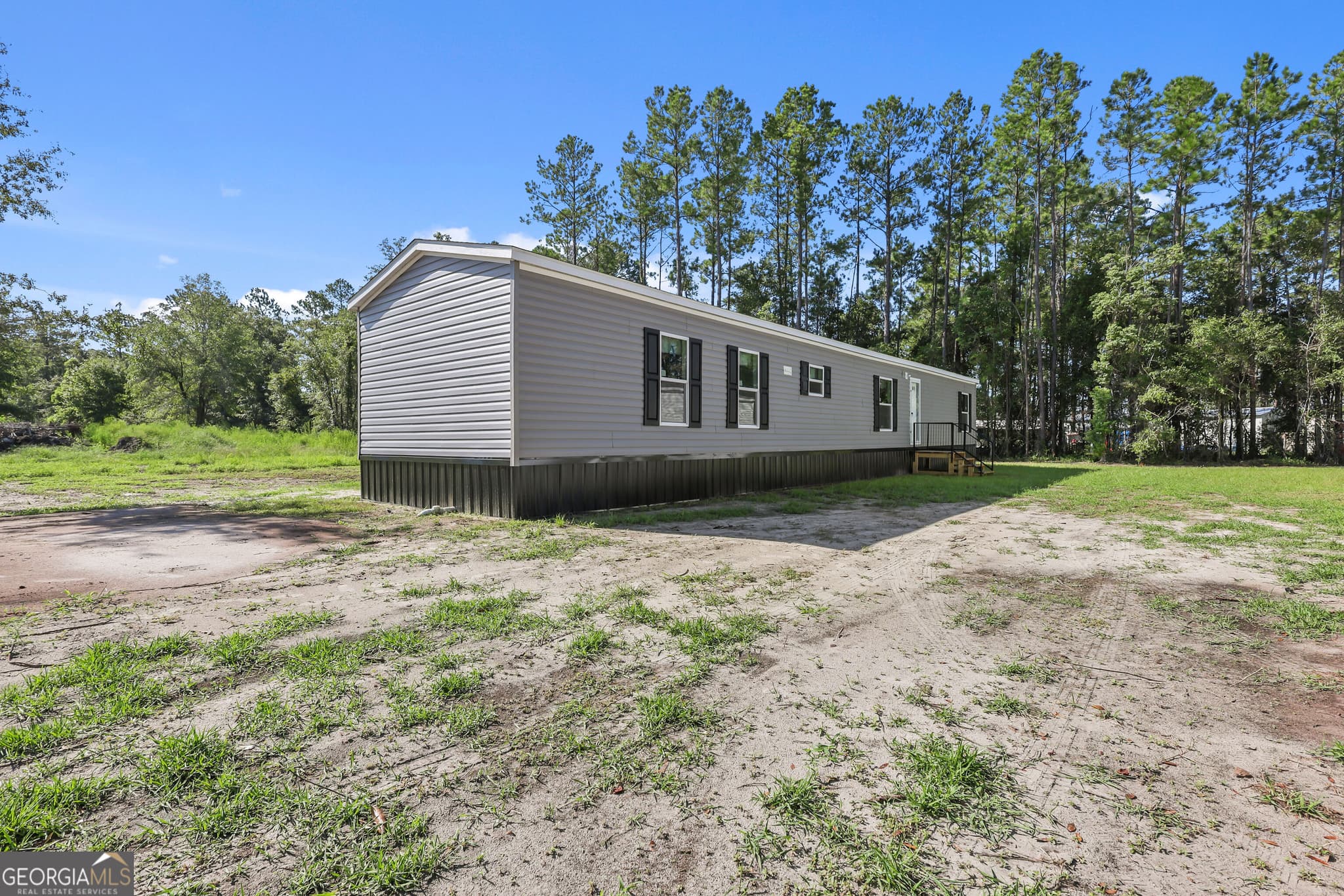 3 bedroom, 2 bathroom, 1,127 sq ft manufactured home,single family residence for sale at 1126 East 121 Place, Folkston, GA 31537 — photo 2