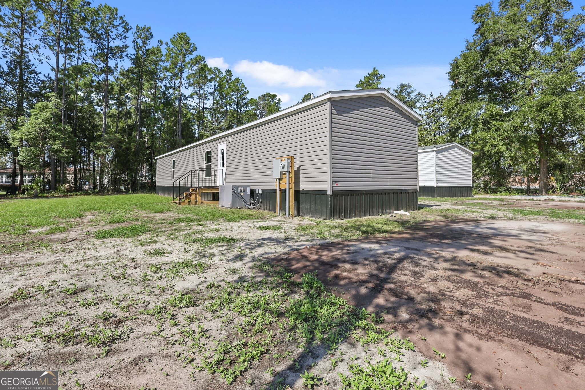 3 bedroom, 2 bathroom, 1,127 sq ft manufactured home,single family residence for sale at 1126 East 121 Place, Folkston, GA 31537 — photo 3