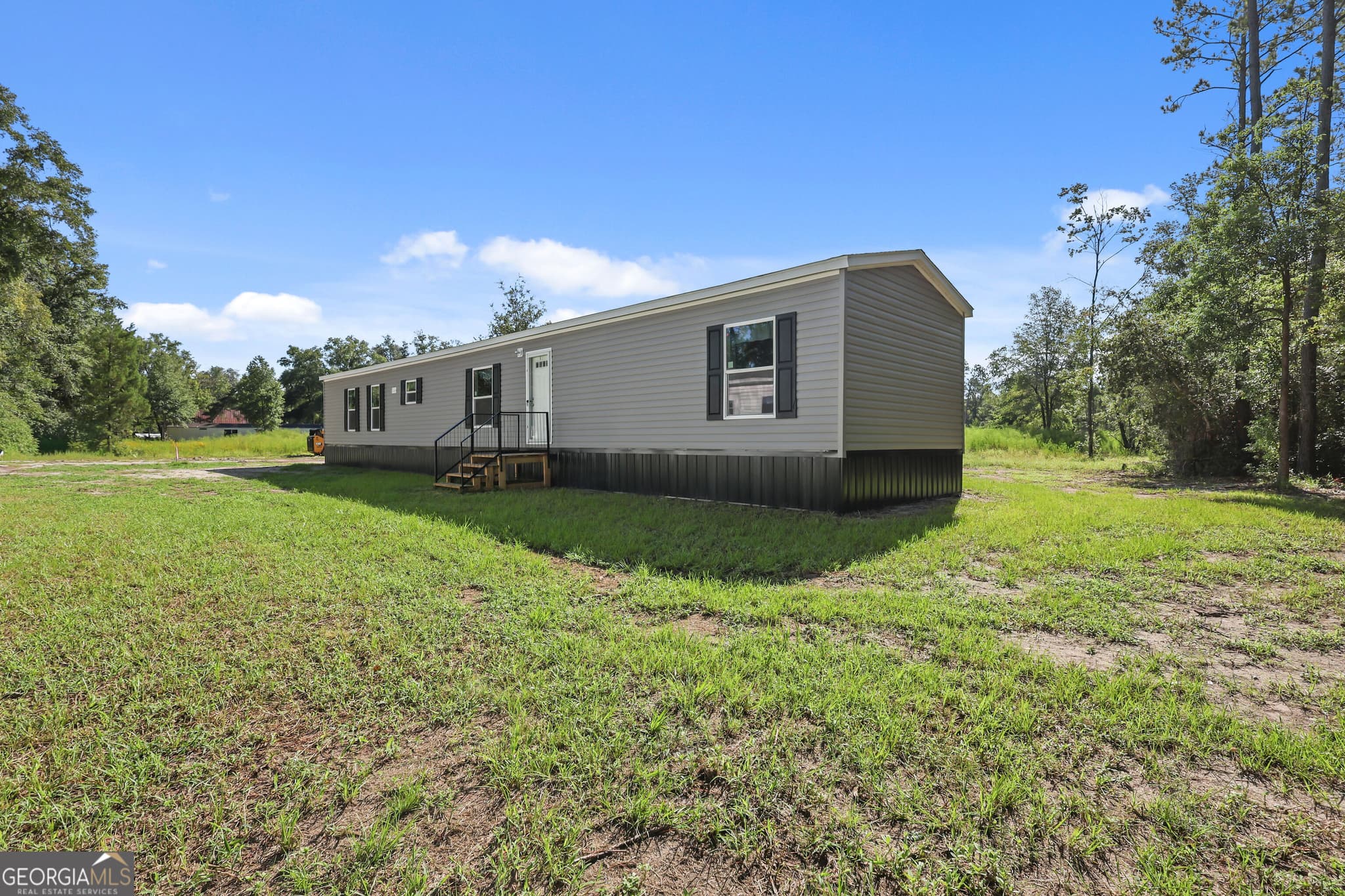 3 bedroom, 2 bathroom, 1,127 sq ft manufactured home,single family residence for sale at 1126 East 121 Place, Folkston, GA 31537
