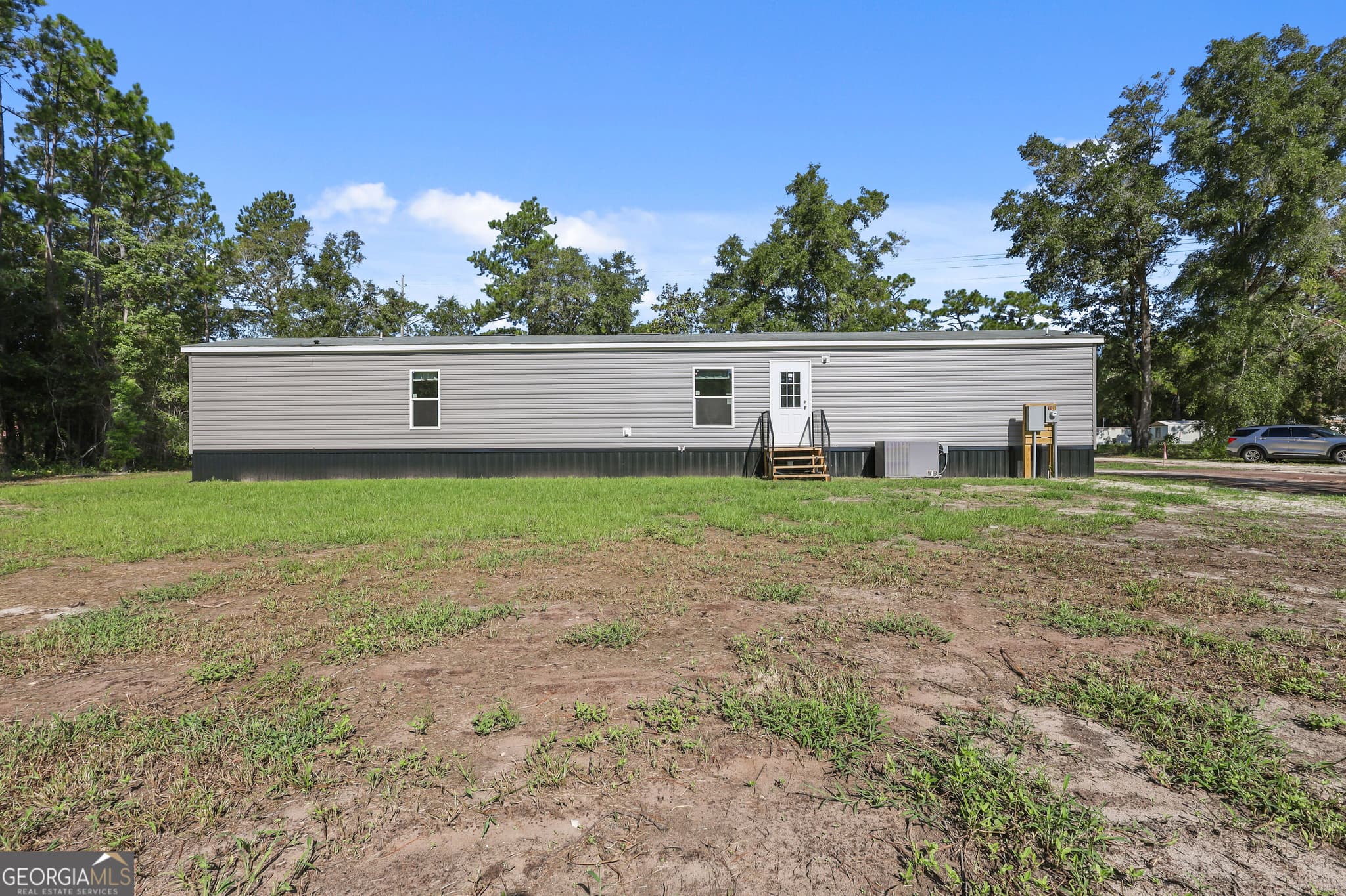 3 bedroom, 2 bathroom, 1,127 sq ft manufactured home,single family residence for sale at 1126 East 121 Place, Folkston, GA 31537 — photo 4