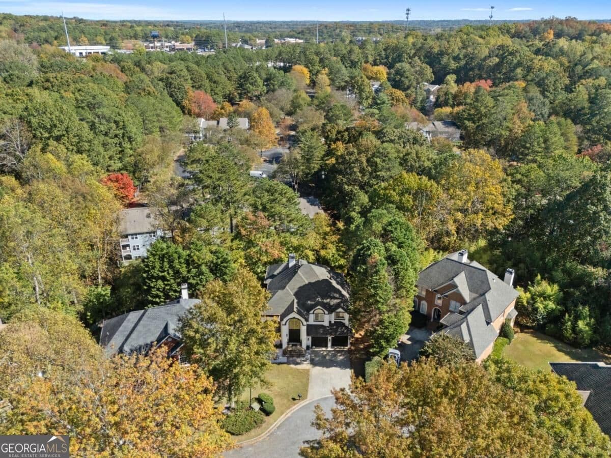 7 bedroom, 5.5 bathroom, 5,400 sq ft single family residence for sale at 820 Glen Royal Drive, Roswell, GA 30076 — photo 2