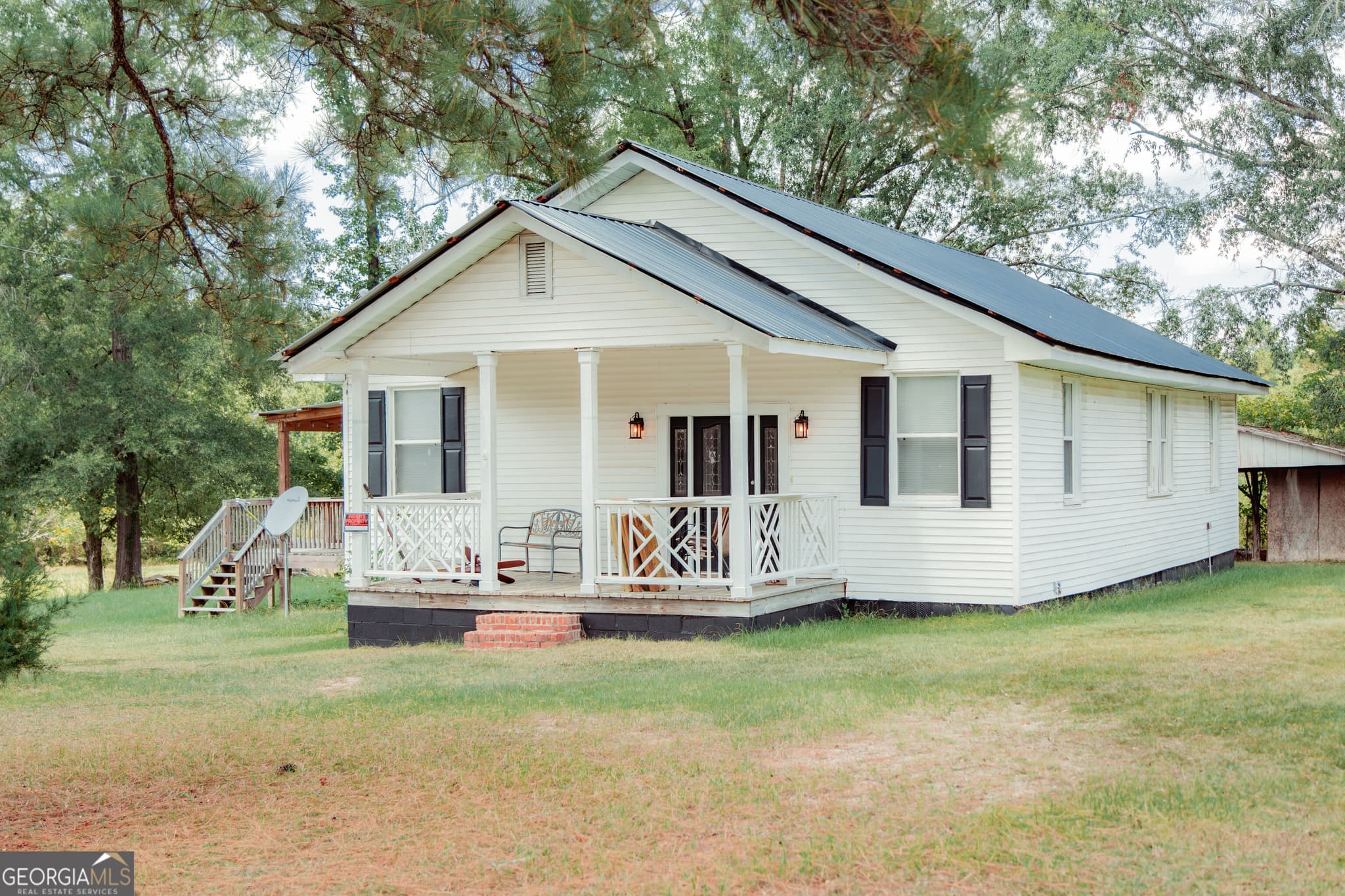 3 bedroom, 2 bathroom, 1,728 sq ft single family residence for sale at 1427 US Hwy 80, Culloden, GA 31016 — photo 2