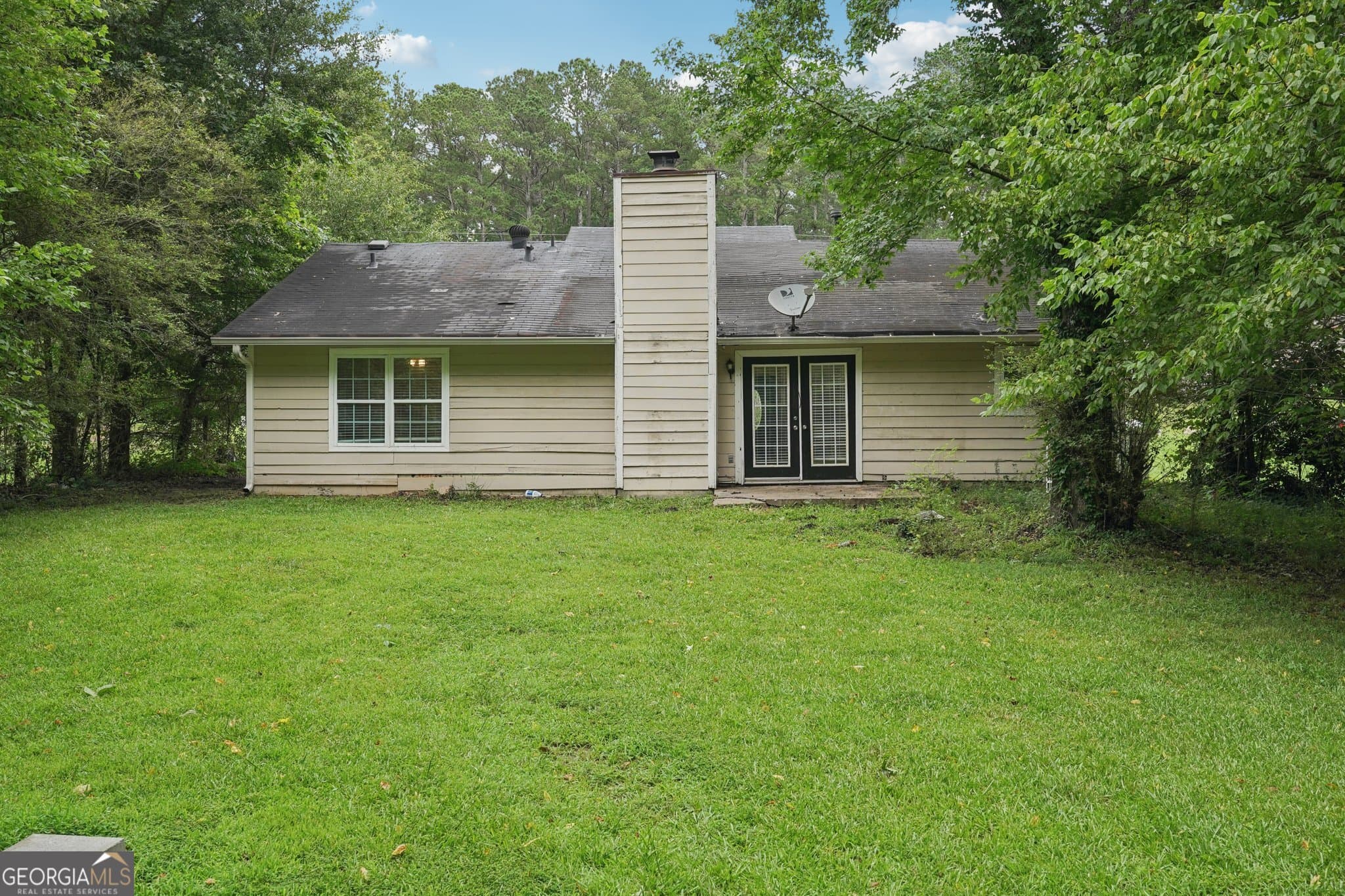 4 bedroom, 2 bathroom, 1,528 sq ft single family residence for sale at 7335 Connell Road, Fairburn, GA 30213 — photo 7