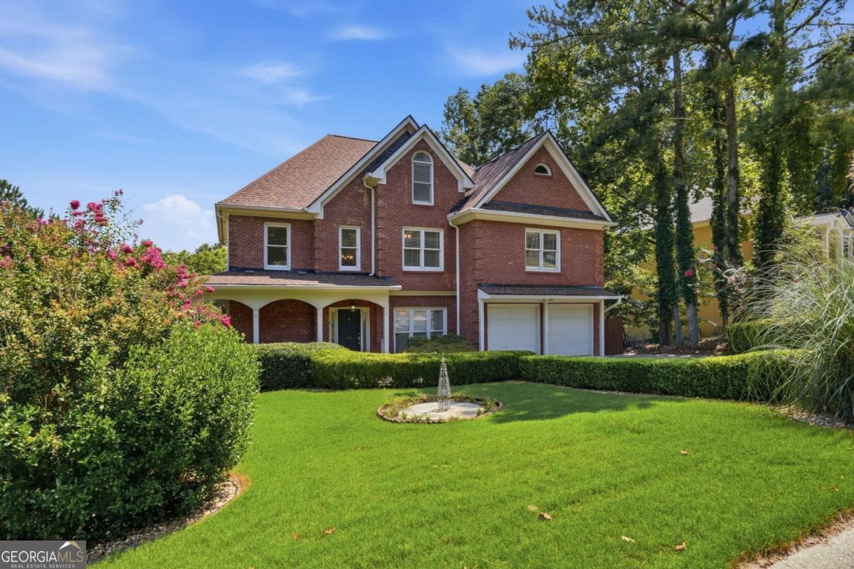 7 bedroom, 5 bathroom, 5,388 sq ft single family residence for sale at 1340 Eryn Circle, Suwanee, GA 30024 — photo 7
