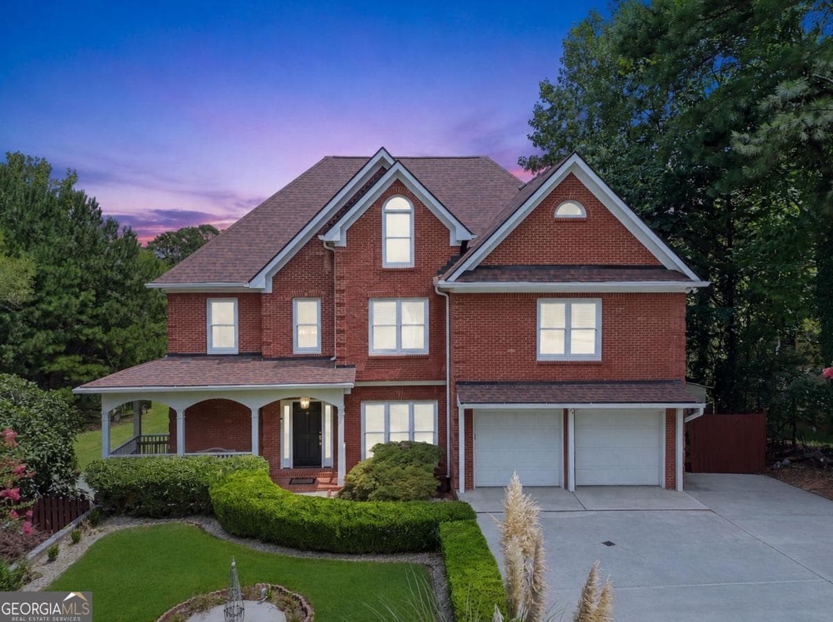 7 bedroom, 5 bathroom, 5,388 sq ft single family residence for sale at 1340 Eryn Circle, Suwanee, GA 30024 — photo 3