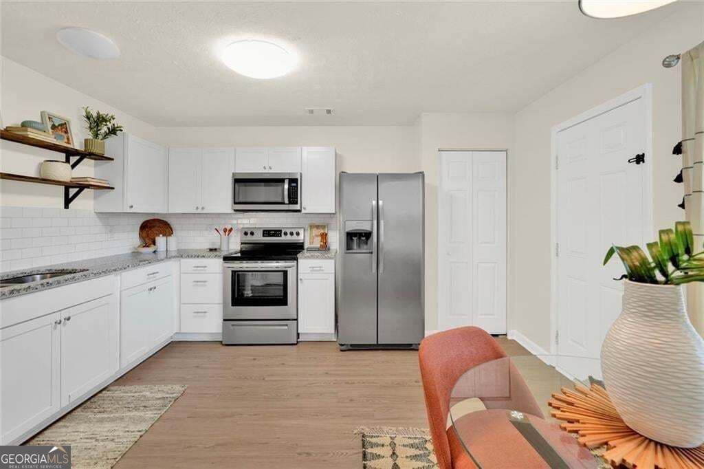 3 bedroom, 2.5 bathroom, 1,273 sq ft condominium for sale at 604 Ivey Court B, Woodstock, GA 30188 — photo 7