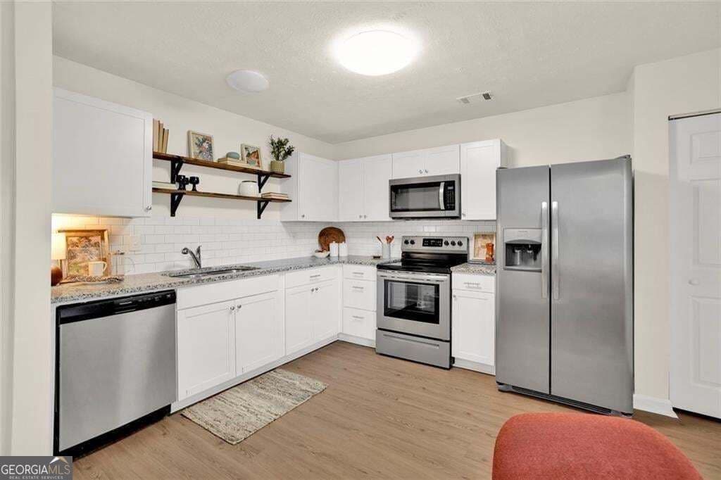 3 bedroom, 2.5 bathroom, 1,273 sq ft condominium for sale at 604 Ivey Court B, Woodstock, GA 30188 — photo 5
