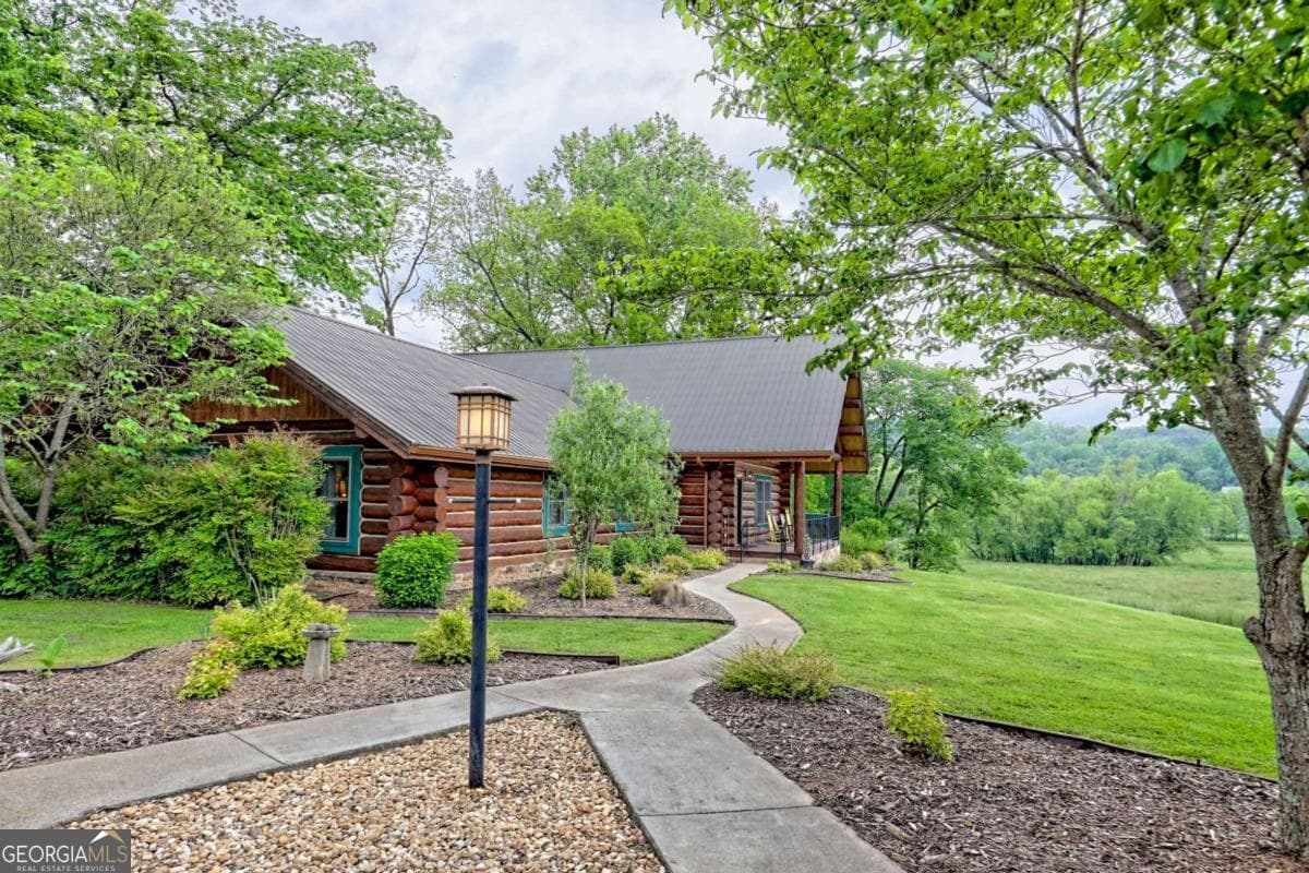 3 bedroom, 3 bathroom single family residence sold at 6487 W Old Hwy 64, Warne, NC 28909