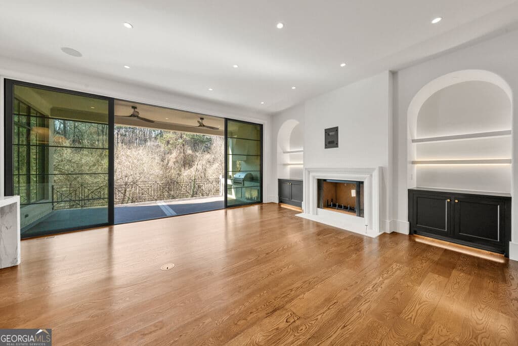 6 bedroom, 7 bathroom, 7,574 sq ft single family residence for sale at 469 Emily Reed Lane LOT 11, Atlanta, GA 30342 — photo 9