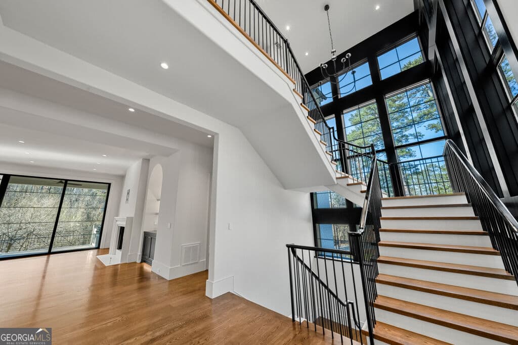 6 bedroom, 7 bathroom, 7,574 sq ft single family residence for sale at 469 Emily Reed Lane LOT 11, Atlanta, GA 30342 — photo 4