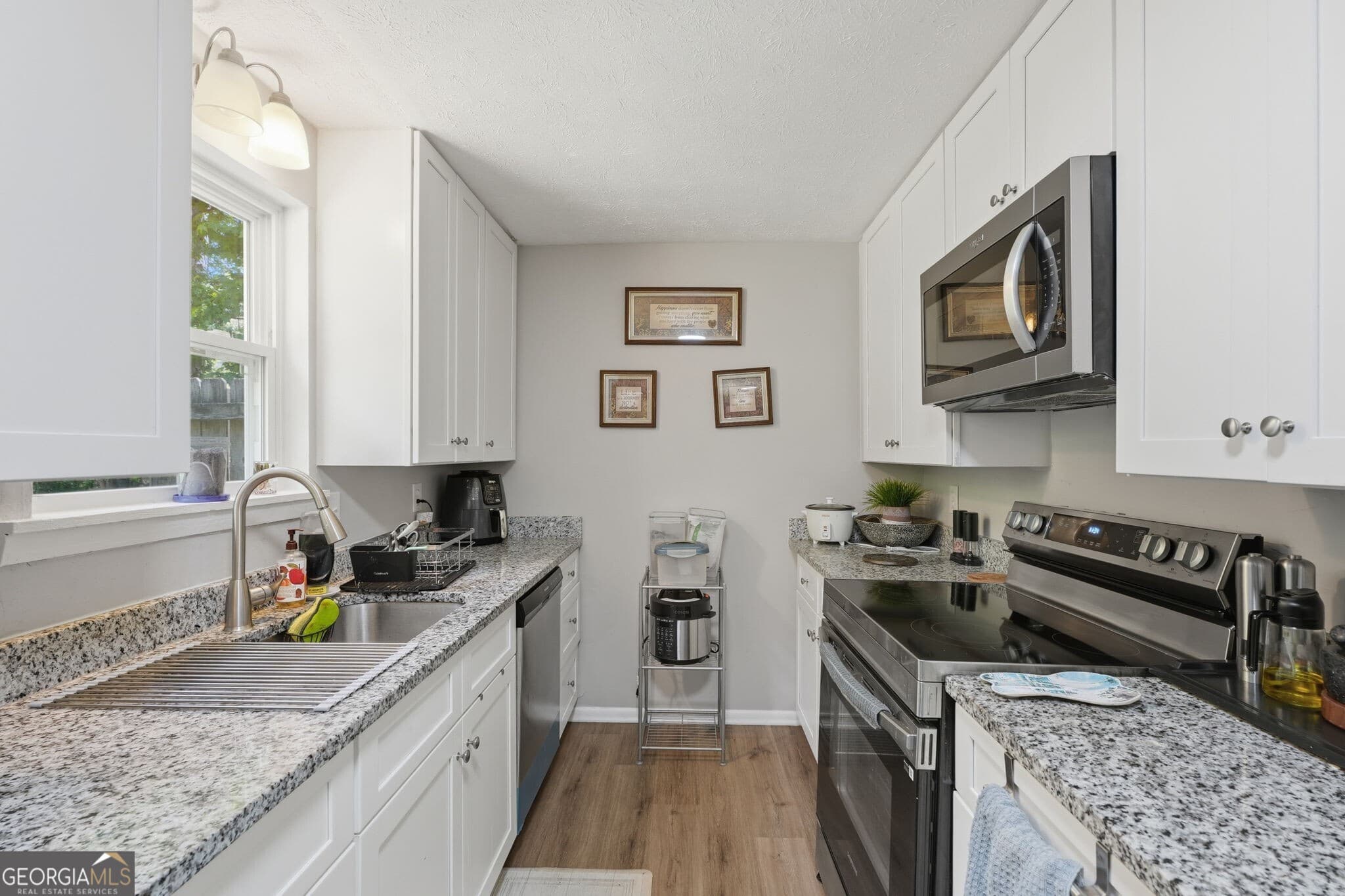 3 bedroom, 2 bathroom, 1,355 sq ft single family residence for sale at 6380 Pleasant Drive, Winston, GA 30187 — photo 9